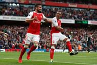 LONDON, ENGLAND - SEPTEMBER 10:  Santi Cazorla of Arsenal (R) celebrates scoring his sides second goal with Olivier Giroud of Arsenal (L) during the Premier League match between Arsenal and Southampton at Emirates Stadium on September 10, 2016 in London, England.  (Photo by Clive Rose/Getty Images)